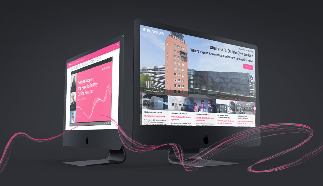 Brainlab Website auf zwei Bildschirmen