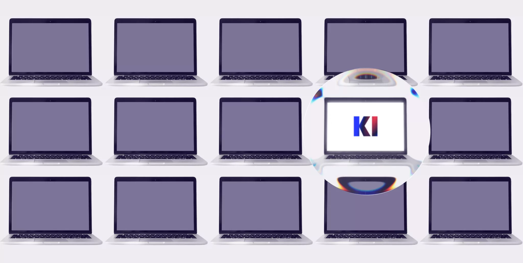 Zwölf Laptops sind in einem Raster angeordnet. Ein Laptop ist vergrößert dargestellt und zeigt auf seinem Bildschirm die Buchstaben „KI“ an.